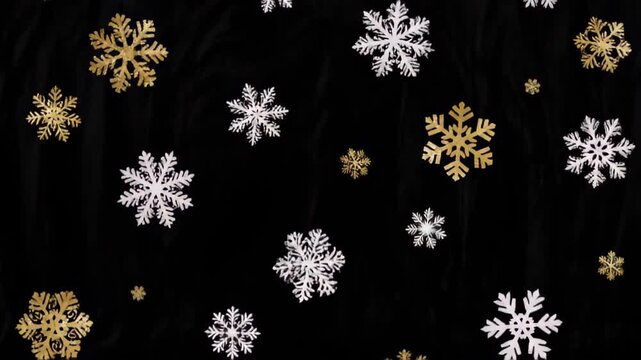Snowflakes gently falling against a dark background, showcasing intricate designs and textures, with a gradual zoom out revealing more of the scene