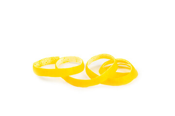 Lemon fruit zest. Fresh yellow organic lemons and a grater isolated on a white background. Citrus zest grater. Lemon twisted peel. Vitamin C. Space for text. Copy space.