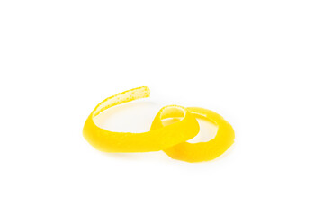 Lemon fruit zest. Fresh yellow organic lemons and a grater isolated on a white background. Citrus zest grater. Lemon twisted peel. Vitamin C. Space for text. Copy space.