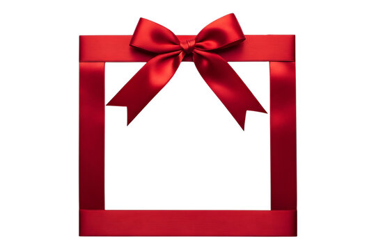 Elegant red ribbon bow forming a decorative frame, isolated on black