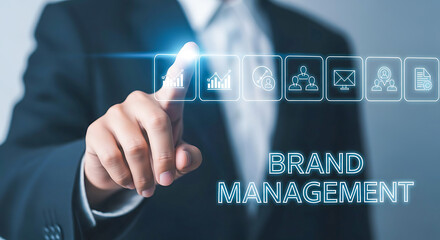 Obraz premium Businessman Interacting with Brand Management Interface