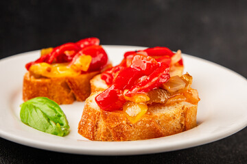 Bruschetta roasted pepper vegetable dish natural product tasty snack fresh delicious gourmet food background on the table rustic top view copy space vegan and vegan food