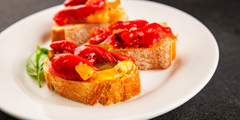 Bruschetta roasted pepper vegetable dish natural product tasty snack fresh delicious gourmet food background on the table rustic top view copy space vegan and vegan food