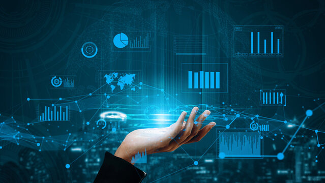 A hand extends towards an array of digital data visualizations, showcasing charts and graphs against a tech-inspired backdrop, symbolizing innovation and connectivity. Xenic