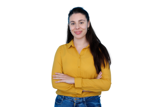 Young confident woman smiling with arms crossed, wearing yellow shirt, standing on transparent background