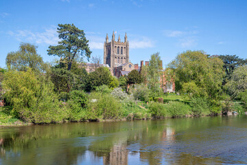 Fototapeta premium Hereford Cathedral viewed across the River Wye on Easter Sunday, Hereford, Herefordshire, England UK