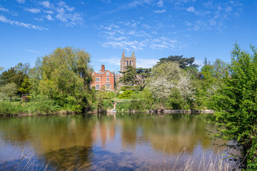 Fototapeta premium Hereford Cathedral viewed across the River Wye on Easter Sunday, Hereford, Herefordshire, England UK
