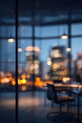 Blurred office interior with city lights at night, creating a serene atmosphere.