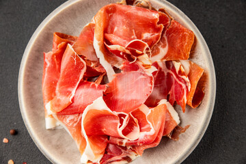jamon serrano meat appetizer jamon iberico natural product tasty snack fresh delicious gourmet food background on the table rustic top view copy space