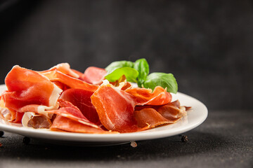jamon serrano meat appetizer jamon iberico natural product tasty snack fresh delicious gourmet food background on the table rustic top view copy space