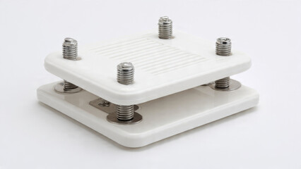 Compact white square press featuring four threaded metal rods and a ribbed top plate, ideal for drying flowers or small craft items.