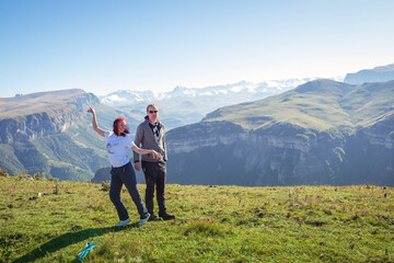 Free time summertime fresh open air hobby activity concept. Two cheerful excited people tourists...