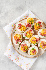 Spicy, stuffed ramen eggs, with bacon and green onions, homemade, no people,