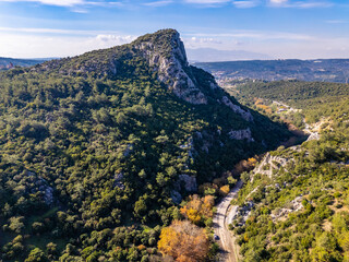 Fototapeta premium Gokdere valley landscape showing autumn trees and winding road