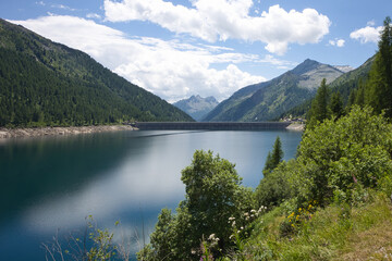 At the end of the Italian Malga Bissina Lake is a dam.