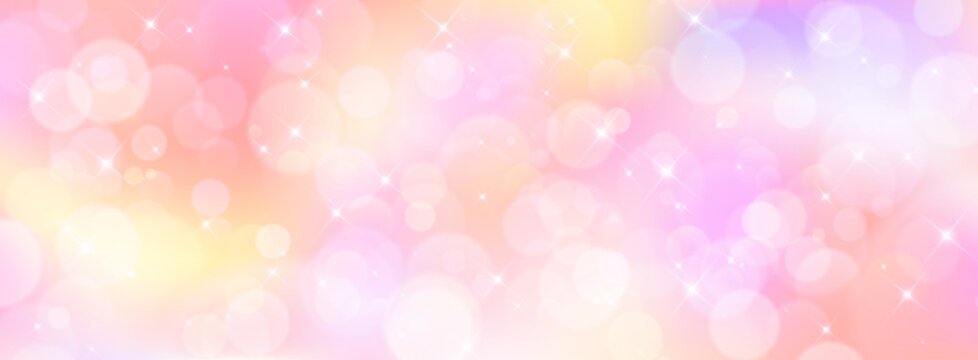 Unicorn bokeh background with glitter and rainbow gradient pattern. Soft pastel yellow, purple and pink colors with sparkling stars in magical atmosphere for fantasy fairy tale or dreamy girly design