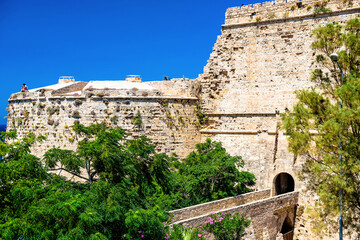 Kyrenia (Girne), CYPRUS - JULY 5: Group of turists at the entrance of Kyrenia castle on July 5, 2015
