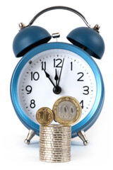 Coins of 1 and 100 Kazakhstani tenge and alarm clock