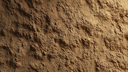 Naklejka premium Close-up of rough, uneven brown texture, sand or dirt. Granular surface with natural light and shadow creating intricate, organic patterns.