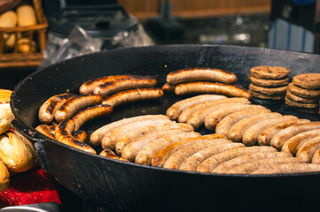 Grilled Sausage with Spices at Christmas Fair