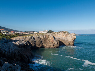 Asturias coastline with cliffs and buildings