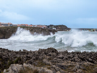 Stormy ocean waves breaking on asturias coast