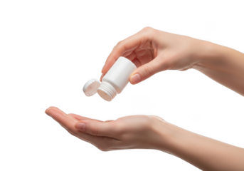 Closeup of a persons hands pouring white pill or capsule from a small plastic medicine bottle onto the palm, isolated on transparent background