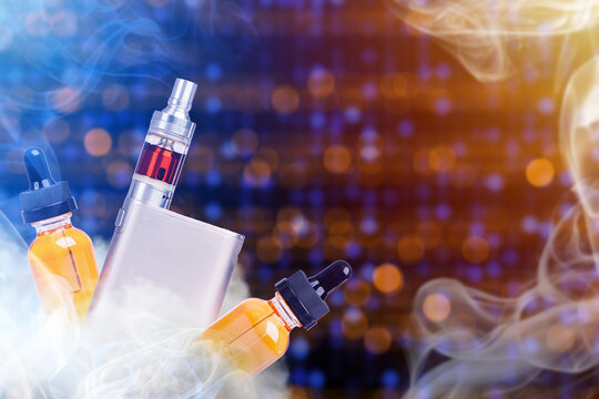 Vape product display shows an electronic vaporizer with flavored e-liquid bottles, highlighting vaping equipment used for aerosol generation and liquid refilling.