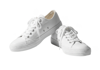 A pair of classic white canvas lowtop sneakers with white laces isolated on transparent background