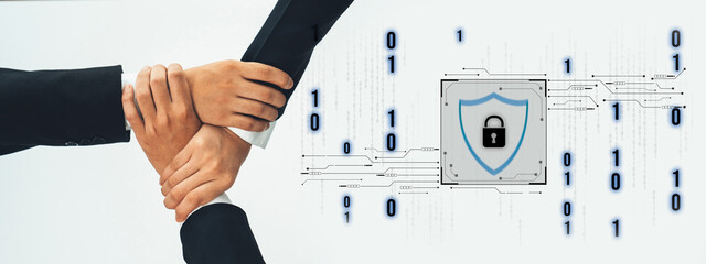 A group of diverse business professionals collaborating on cybersecurity concepts, illustrating teamwork and the importance of digital protection in today technology-driven world. Trope