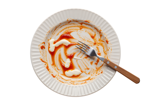 Empty white plate with pasta sauce remnants and a fork top view on transparent background.