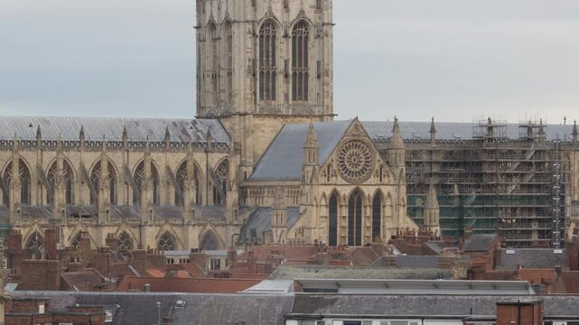 Closeup timelapse of historic York Minster Cathedral in York UK overlooking Rooftops with intricate Architecture and scenic views