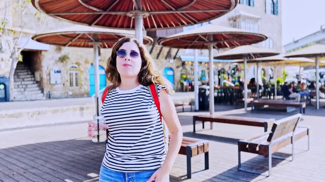 Tourist Woman Drinking Refreshing Beverage At Jaffa Port