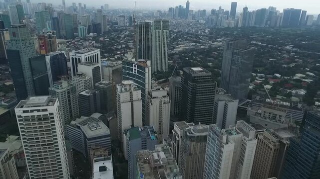 Manila Makati City in Philippines. Cityscape Skyline and Business Skyscrapers in Background. Manila Business District Traffic.