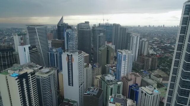 Makati City in Philippines. Cityscape Skyline Traffic and Skyscrapers in Background. Manila Business District.