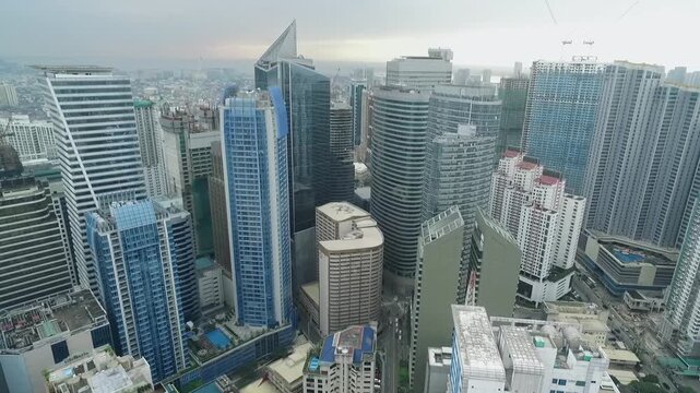 Manila Makati City in Philippines. Cityscape Skyline and Business Skyscrapers in Background. Manila Business District Traffic.