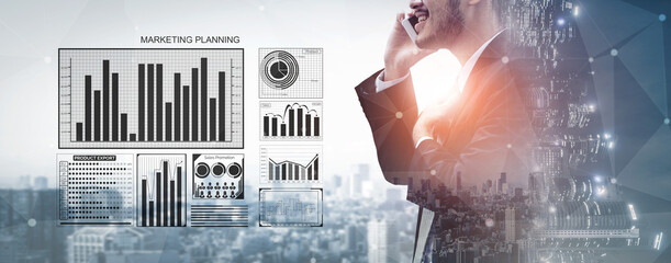 A businessman speaks on the phone while surrounded by digital marketing analytics graphs and a modern cityscape, representing strategic planning and growth. Impute