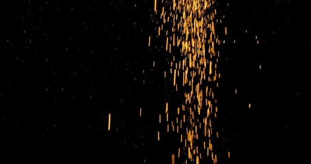 Fototapeta premium Abstract particles of gold dust float in the air