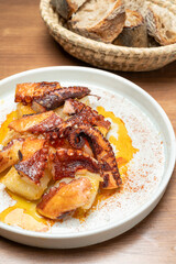 Grilled octopus with potatoes and paprika, spanish tapas