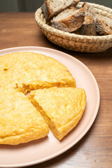 Spanish omelette tortilla de patatas serving with bread