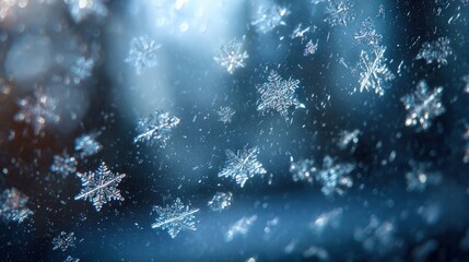 snowflakes landing on frosty window glass,
