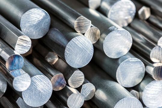 A stack of steel rods with a cross section texture, products of the metallurgical industry