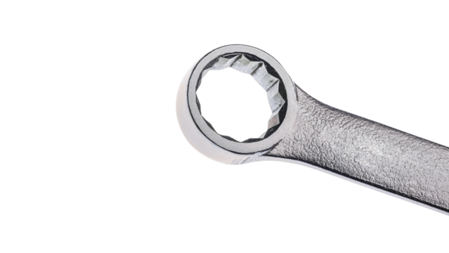 Close-up view of a chrome-plated wrench with a 12-point socket, highlighting its precise engineering and durable construction for mechanical tasks