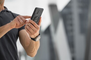 Happy business man with phone, social media concept