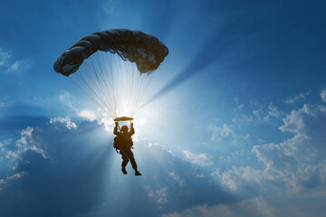 Parachutist jumping in the sky 