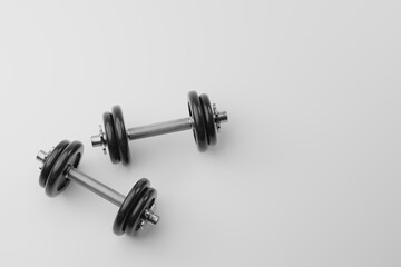 Minimal pair of black adjustable dumbbells on light background. 3d rendering