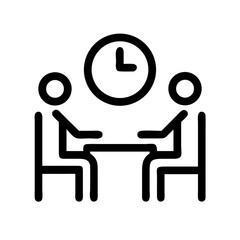 Two people sitting at a table with a clock above them indicating a meeting or scheduled appointment time