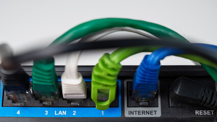 Colorful Ethernet Cables Connected to a Router. 