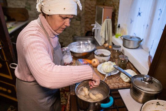Grandma is cooking dumplings