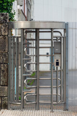 revolving passage metal gate with a keypad
